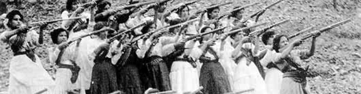 Photo of women aiming guns during the Mexican Revolution, which lasted from 1910 through 1920.